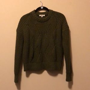 green thick sweater